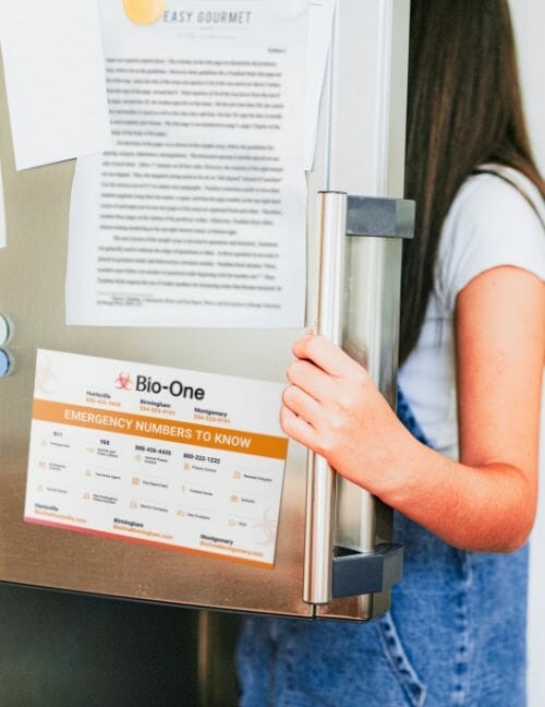 Woman Holding Fridge Open Door